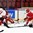HELSINKI, FINLAND - JANUARY 2: Switzerland's Julien Privet #11 gets the puck past Belarus' Ivan Kulbakov #31 for a third period goal with Ilya Sushko #5 and Alexander Patsenkin #16 in front during relegation round action at the 2016 IIHF World Junior Championship. (Photo by Matt Zambonin/HHOF-IIHF Images)

